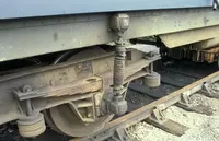 Link from bogie to underframe