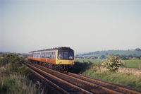 Strathclyde liveried Class 107 DMU in countryside