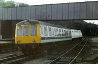 This Class 114 DMU had become de-railed at the south end of Sheffield station on 17th May 1979. Rescue came in the form of the Tinsley breakdown crane.