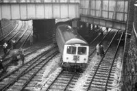 The first of seven images showing a Cravens two-car DMU that tried to go under the Newport Street bridge at Bolton on two different lines. Thought to be M50807, 27 August 1968.