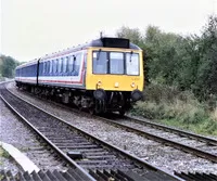 Class 117 DMU at Rectory Lane Crossing