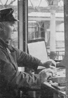 Driver at controls of diesel railbus