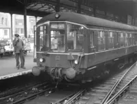 Green DMU in station