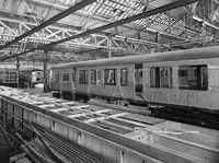 Vehicles under construction with underframe in foreground